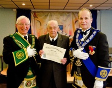 Bro. Les Duff R.W.M., in the company of our R.W.P.G.M. presents Bro. George Arbuckle M.M. with his jubilee diploma
