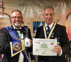Bro. Craig Gordon presents a certificate to our Right Worshipful Master Bro. Gordon Yeoman to mark the contribution made by 482 to the recent Provincial Grand Lodge of Midlothian Charity Golf Tournament.